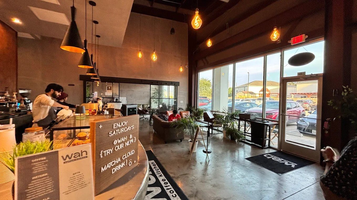 Wah Coffee — main floor with windows and lounge
